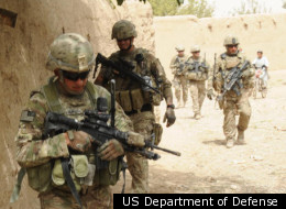U.S. Army Sgt. 1st Class John Shimkus (left) on patrol with his platoon in Kandahar, Afghanistan, last year.