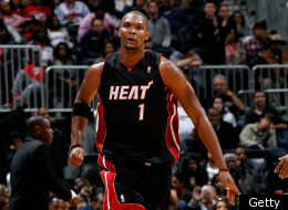 ATLANTA, GA - JANUARY 05: Chris Bosh #1 of the Miami Heat reacts after hitting a basket against the Atlanta Hawks at Philips Arena on January 5, 2012 in Atlanta, Georgia.