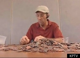 Dan Johnson Sr. seen sifting through coins to find the rare money that three burglars stole from him.