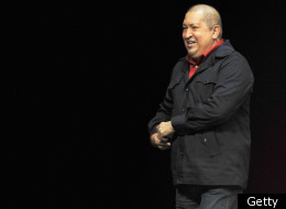 Venezulan President Hugo Chavez smiles during the launching of the 'Amor Mayor' program, which seeks to help senior citizens, in Caracas on December 13, 2011. (Getty)