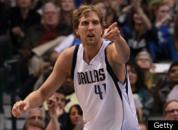 DALLAS, TX - JANUARY 04: Dirk Nowitzki #41 of the Dallas Mavericks reacts after scoring against the Phoenix Suns at American Airlines Center on January 4, 2012 in Dallas, Texas. Nowitzki was playing in his 1,000 career game.