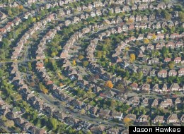 An aerial view of houses in the suburb of north east London, England. (Jason Hawkes)