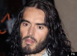 Russell Brand has flown back to the US for the first time since his split was announced
