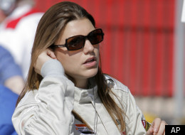 Champ car drive Katherine Legge, of England, gets ready for practice for the Vegas Grand Prix auto racing on Saturday, April 7, 2007, in Las Vegas. (AP Photo/Jae C. Hong)