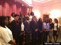 D.C. Mayor Vincent Gray stands with members of the D.C. Youth Advisory Council on Tuesday night at the Charles Sumner School Museum and Archives.
