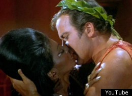 Nichelle Nichols and William Shatner capture an historic moment as they engage in the first interracial televised kiss during a 1968 episode of