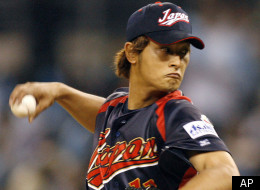 FILE - In this March 17, 2009 file photo, Japan's starter Yu Darvish pitches against South Korea in the first inning of their World Baseball Classic game in San Diego. Darvish ended months of speculation Thursday, Dec. 8, 2011 by saying he intends to make a move to Major League Baseball. (AP Photo/Denis Poroy, File)