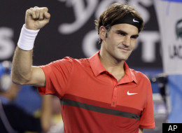 Switzerland's Roger Federer celebrates after defeating Australia's Bernard Tomic during their fourth round match at the Australian Open tennis championship in Melbourne, Australia, Sunday, Jan. 22, 2012. (AP Photo/Sarah Ivey)