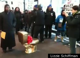 Activists deliver a