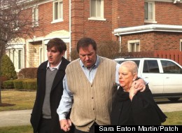 Bob Bashara, center, with his son and mother before speaking to the media outside his home Feb. 1.