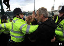 Climate change protesters confront police near the Ratcliffe-on-Soar power station in 2009