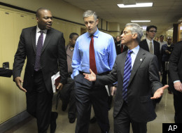 Former Chicago Public Schools CEO and current Secretary of Education Arne Duncan (center) is among the former CPS employees reportedly paid thousands for their unpaid sick and vacation days. Over the last six years, the cash-strapped system has paid out $265 million because of the policy.