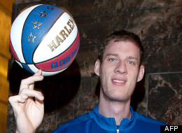Gentle giant: 'Tiny' Sturgess shows off his ball skills