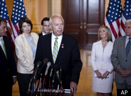 Rep. John Kline, R-Minn., center, accompanied by fellow Republican House members, speaks on Capitol Hill in Washington, Tuesday, Aug. 10, 2010, following a caucus.