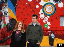 Mark Ronson and Katy B pose by the Olympic Beat Wall