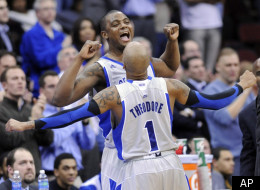 Seton Hall's Herb Pope celebrates with Jordan Theodore (1) during the second half of an NCAA college basketball game against Georgetown Tuesday, Feb. 21, 2012, in Newark, N.J. Seton Hall defeated Georgetown 73-55. (AP Photo/Bill Kostroun)