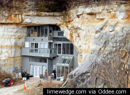 This modern and energy-efficient 15,000-square-foot home is built within a sandstone cave in Festus, Missouri. Built by Curt and Deborah Sleeper, the home features modern interiors that blend with the natural unfinished sandstone walls. Thanks to geothermal heating and clever design, there is no need for air conditioning or a furnace to heat/cool the home.