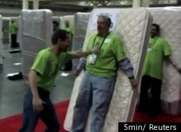 850 people in New Orleans toppled the human mattress domino record of 550.