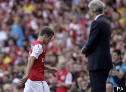 Jack Wilshere hobbles off last July in the Emirates Cup