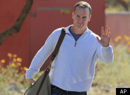 NFL quarterback Peyton Manning leaves the Arizona Cardinals training facility after a five hour meeting with coaches and front office staff Sunday, March 11, 2012, in Tempe, Ariz.(AP Photo/Ross D. Franklin)