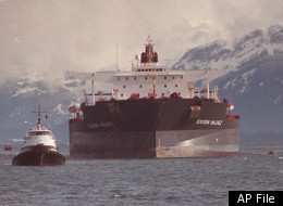 In this June 23, 1989 photo, the Exxon Valdez oil tanker is towed out of Prince William Sound in Alaska by a tug boat and a U.S. Coast Guard Cutter. The Exxon Valdez was sold for $16 million.