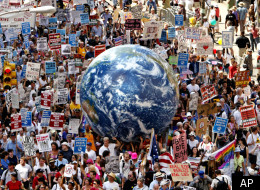 A crowd fills a Manhattan avenue during a protest march leading up to the Republican National Convention site sponsored by United for Peace and Justice, in New York, Sunday, Aug. 29, 2004, the day before the Republican National Convention (AP Photo/Joe Cavaretta )