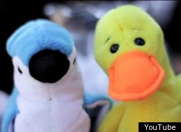 A blue jay and yellow duck take on the roles of Katniss and Peeta, respectively.