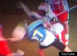 Virginia's Pat Harbeson delivered an illegal hit on Johns Hopkins' Rob Guida.