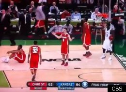 Aaron Craft and his Ohio State teammates stand by in disbelief as Final Four game against Kansas comes to an end.