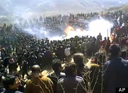 This image from video, released Friday, March 23, 2012 by London-based activist group Free Tibet, reportedly shows the cremation of Sonam Thargyal, a 44-year-old farmer who doused himself with kerosene before setting himself on fire earlier this month . A state-run Chinese website has launched a bitter attack on the Dalai Lama, accusing the exiled Buddhist leader of