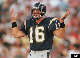 FILE: San Diego Chargers' quarterback Ryan Leaf tries to figure out what play is being called against the San Francisco 49ers Aug. 8, 1998.