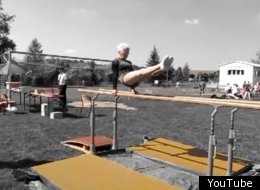 Johanna Quaas, 86, performs a routine on the parallel bars.