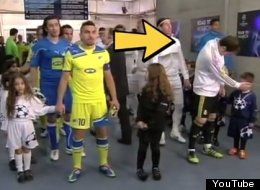 Iker Casillas wipes his snot-ridden hand on a mascot's face