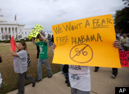 Opponents of the Alabama immigration law protest outside of the state Capitol.