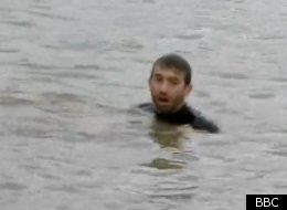 The Boat Race between Oxford and Cambridge was halted on Saturday when a protester jumped into the Thames River.