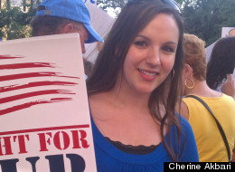 Cherine Akbari protests teacher layoffs in Florida's Broward County.