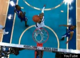 Vince Carter air balls a layup.