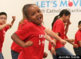 Kids join in the filming of Catholic Charities’ video for Beyoncé’s Let’s Move anthem, “Move Your Body.” (Jennifer Sirota)