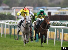 Neptune Collonges ridden by Daryl Jacob (left) races against Sunnyhillboy ridden by Richie McLernon (right)