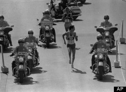 Alberto Salazar of Wayland, Mass., looks over his shoulder to check on Dick Beardsley, rear, of Rush City, Minnesota, as they neared the finish line April 19, 1982 in the 86th annual Boston Marathon.