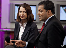 Wildrose leader Danielle Smith listens to Liberal leader Raj Sherman during the CBC leaders forum in Edmonton Thursday April 19, 2012. THE CANADIAN PRESS/Jason Franson
