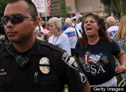 Tea Party activist Allison Culver shouts at opponents during a demonstration against illegal immigration on July 31, 2010 in Phoenix, Arizona. (File photo by John Moore/Getty Images)