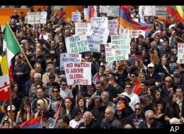 Thousands of demonstrators march to mark the death of 1.5 million Armenians in the former Ottoman empire, in Los Angeles Tuesday, April 24, 2012. (AP)