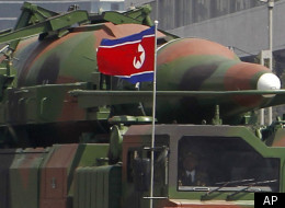 In this photo taken Sunday, April 15, 2012, what appears to be a new missile is carried during a mass military parade at the Kim Il Sung Square in Pyongyang, North Korea, to celebrate the 100th anniversary of the country's founding father Kim Il Sung. (AP Photo/Ng Han Guan)
