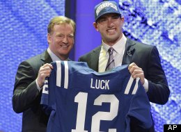 NFL Draft Results 2012: Andrew Luck, right, poses for photographs with NFL Commissioner Roger Goodell after he was selected as the first pick overall by the Indianapolis Colts in the first round of the NFL football draft at Radio City Music Hall, Thursday, April 26, 2012, in New York.