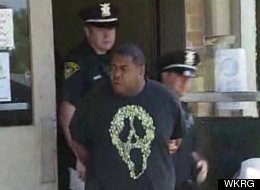 Terry Rawls surrendered to police Wednesday in the alleged beating of Matthew Owens. Cops called their fight an ongoing dispute.