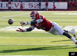 Rutgers wide receiver Mohamed Sanu (6) stretches for a pass during an NCAA college football game against Cincinnati in Piscataway, N.J., Saturday, Nov. 19, 2011. Rutgers won 20-3. (AP Photo/Mel Evans)
