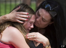 Skye Soutar (left) is consoled by her mother Pam after leaving the funeral for seven-year-old Katelynn Sampson in Toronto on Tuesday August 12, 2008. Hundreds of mourners grieved at the funeral for a seven-year-old girl who was found dead in her caregiver's apartment with savage injuries that shocked even hardened police officers.