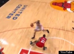 Bulls' Joakim Noah makes Sixers forward Thaddeus Young fall down with nice fake.