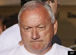 Arizona State Sen. Russell Pearce prepares to address the media late Tuesday, Nov. 8, 2011, after his recall.